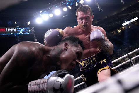 Canelo Álvarez dominates Jermell Charlo to stay undisputed .